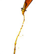 orange Flüssigkeit fließt aus einer Flasche #1