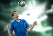 Young football player with ball