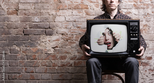Photo: TV with a picture of the girl TV with a picture of the girl