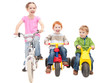 Children riding bikes and kids trikes Children riding bikes and kids trikes