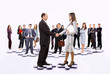 Smiling business people and business shake