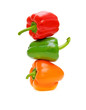 Bulgarian peppers of different colors on a white background