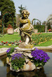Small fountain in a beautiful botanic garden Small fountain in a beautiful botanic garden