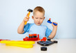 Little boy playing with toy tool Little boy playing with toy tool