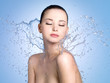 Woman in splashes of water
