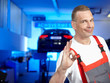 Motormechanic in a garage shows ok