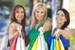 Three Beautiful Women With Fashion Shopping Bags