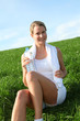 Woman drinking water from water during fitness activity