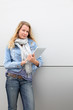 Blond woman using electronic tablet