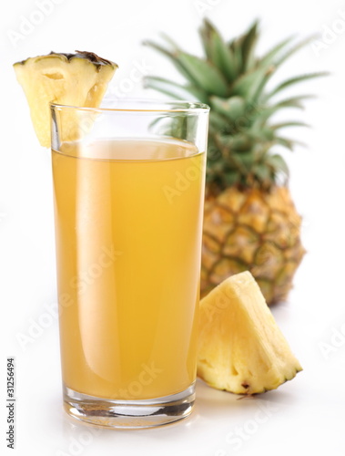 Photo: Pineapple juice and fruit. Pineapple juice and fruit.