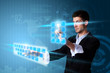 Man pressing modern touch screen buttons with a blue technology Man pressing modern touch screen buttons with a blue technology