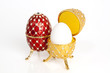 Two jewels eggs with a real one