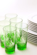 White plates and green glasses