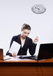 businesswoman with two laptops