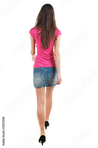 Photo: The going woman. Rear view. The going woman. Rear view.