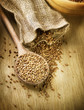 Buckwheat groats in a wooden spoon