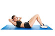 Fitness woman doing crunches on gym mat