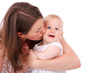 mother kissing baby