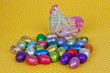 Chicken with Easter chocolate eggs