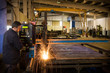 Photo: Cutting metal with CNC laser motion blurred. Cutting metal with CNC laser motion blurred.