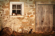Rural barn wirh cats laying in the sun Rural barn wirh cats laying in the sun