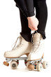 girl with roller skates isolated on white background