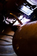 worker weld metal in factory and sparks