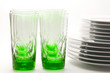 White plates and green glasses