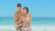 Sweet couple having fun with a camera