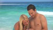 Couple laughing about their pictures 