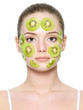 Fruit facial mask on female face