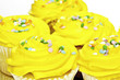 Several yellow cupcakes