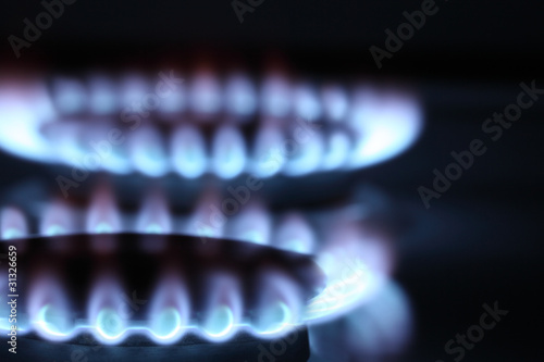 Photo: Close up view on two burners of cooker Close up view on two burners of cooker