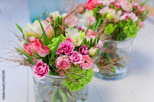 Photo: bouquet standing on a white flor bouquet standing on a white flor