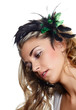 beautiful woman with feather hair flower.