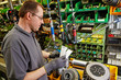 skilled industrial worker checking the routing slip