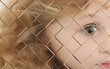 Autistic Child Blurred Behind Pane Of Glass