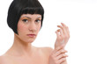 young beautiful woman applying hands cream