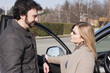 Young Adult Couple with Car