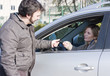 Young Adult Couple with Car