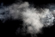 White smoke on black background. Isolated.