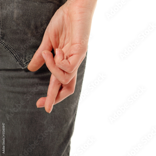 Foto: fingers crossed isolated on white fingers crossed isolated on white