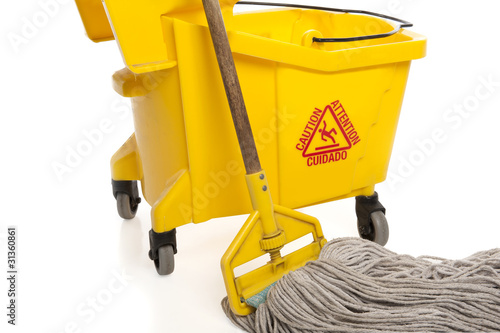 Photo: Industrial Mop and bucket close-up Industrial Mop and bucket close-up