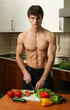 Young Muscular Man Preparing Salad