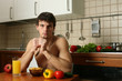 Young Muscular Man Eating His Breakfast