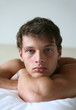 Young Sexy Man on a Bed