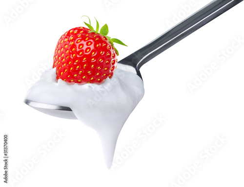 Photo: Spoon of strawberry yoghurt isolated on white Spoon of strawberry yoghurt isolated on white