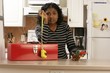 Woman Looking Hopeless With Toolbox And Tools