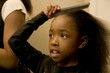 Girl Combing Hair