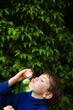 Photo: Boy Blowing Bubbles Boy Blowing Bubbles